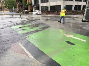 City workers at scene opf watermain break at Nepean and O'Connor streets.