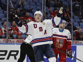 In this Jan. 5, 2018 file photo, United States forward Brady Tkachuk (7) celebrates a goal during the second period in the bronze medal game of the world junior hockey championships against the Czech Republic in Buffalo, N.Y. Former NHL star Keith Tkachuk already has one son, Matthew, following in his footsteps. Soon, there could be a second. Brady Tkachuk, 18, is considered the top U.S-born draft prospect after his freshman season at Boston University.