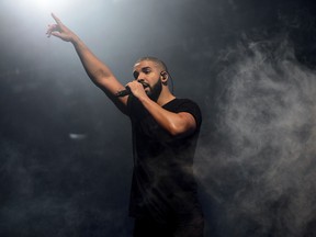 FILE - In this June 27, 2015 file photo, Canadian singer Drake performs on the main stage at Wireless festival in Finsbury Park, London. Drake's "Scorpion," the highly anticipated, 25-track album by pop music's No. 1 player, was released Friday.