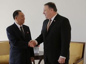 Kim Yong Chol, left, former North Korean military intelligence chief and one of leader Kim Jong Un's closest aides, shakes hands with U.S. Secretary of State Mike Pompeo during a meeting, Thursday, May 31, 2018, in New York.