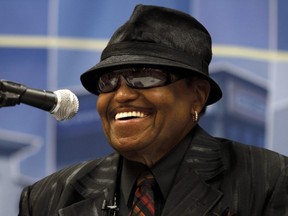In this June 2, 2010 file photo, Joe Jackson, father of the late Michael Jackson, laughs during a news conference about the construction of the proposed Michael Jackson Performing Arts and Cultural Center and Museum, in Gary, Ind.