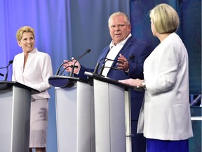 Party leaders, left to right, Kathleen Wynne Doug Ford and Andrea Horwath participate during the third and final televised debate of the campaign in Toronto on May 27.