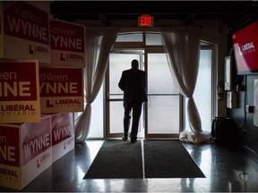OPP wait for the the arrival of Ontario premier Kathleen Wynne prior to the start of the Liberal election party in Toronto on election day in Ontario on Thursday, June 7, 2018.