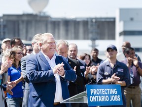 Ontario Premier Doug Ford at the Pickering nuclear-power station, promising to protect Ontario jobs.