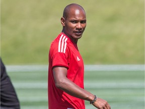 Head coach Julian de Guzman talks to a player during the Ottawa Fury practice at TD Place.