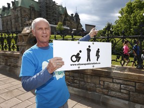 Alan Etherington points out a well hidden public bathroom near the East Block on Parliament Hill  (Photo: Tony Caldwell)