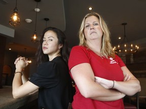 Erin Gee, co-founder of Bad & Bitchy podcast, and Veronique Prevost, Vice President of Local 6004, pose for a photo in Ottawa Wednesday June 6, 2018. Erin and Veronique are organizers of a campaign against sexual harassment in the local service industry.