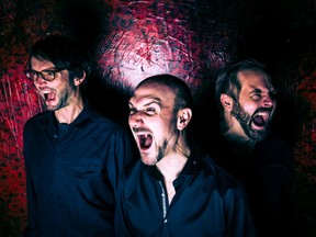 Peter Van Huffel, centre, with drummer Rudi Fischerlehner, left, and bassist Roland Fidezius, right, are in the band Peter Van Huffel's Gorilla Mask.