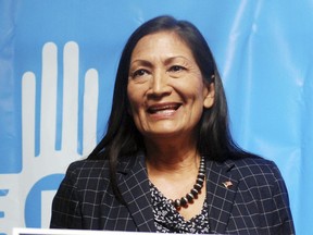 New Mexico's Democratic nominee to the Albuquerque-based congressional district, Debra Haaland, speaks at a celebratory breakfast in Albuquerque, N.M., on Wednesday, June 6, 2018. Haaland is trying to become the first Native American woman to serve in the House of Representatives. Tuesday's primary election upended the political landscape in New Mexico by setting up general-election showdowns between women in two open congressional seats and casting aside an incumbent Democratic state lawmaker who is embroiled sexual harassment accusations.