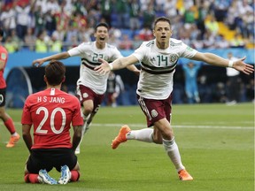 Mexico's Javier Hernandez celebrates after scoring his side's second goal during Saturday's Group F match against South Korea at Rostov-on-Don, Russia.