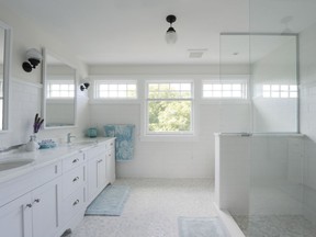 This open-concept bathroom was renovated by Crossford Construction. The approximately two-month transformation changed the outdated and cramped bathroom to a fresh and modern space.