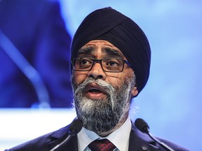 Canada's National Defense Minister Harjit Singh Sajjan delivers his speech during the second plenary session of the 17th International Institute for Strategic Studies (IISS) Shangri-la Dialogue, an annual defense and security forum in Asia, in Singapore, Saturday, June 2, 2018, in Singapore.