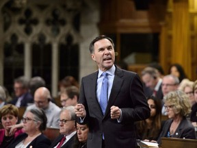 Minister of Finance Bill Morneau stands during question period in the House of Commons on Parliament Hill in Ottawa on Tuesday, June 5, 2018.