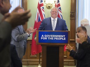 Premier-designate Doug Ford addresses his caucus and the media at Queen's Park in Toronto, Ont. on Tuesday June 19, 2018.
