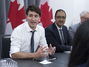 Prime Minister Justin Trudeau and Amarjeet Sohi, the minister of Infrastructure and Communities, meet with municipal leaders at the Federation of Canadian Municipalities' 2018 Annual Conference in Halifax on Friday, June 1, 2018.