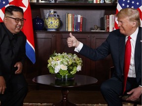 President Donald Trump meets with North Korean leader Kim Jong Un on Sentosa Island, Tuesday, June 12, 2018, in Singapore.