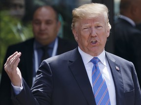 Donald Trump renewed attacks Monday on Canadian Prime Minister Justin Trudeau, who had hosted the G7 meeting in Quebec.