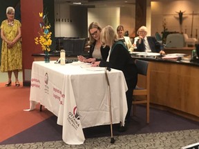 Regan Preszcator being sworn in to represent Ottawa Catholic School Board's River/Capital ward left vacant after the death of long-time trustee Kathy Ablett.