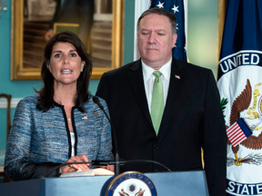 U.S. Ambassador to the United Nations Nikki Haley and U.S. Secretary of State Mike Pompeo speak in Washington D.C. on June 19, 2018.