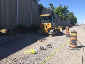 Ministry of Labour inspectors examined a Maitland Avenue and Highway 417 construction site Monday afternoon, where a worker was run over by a bulldozer earlier in the day.