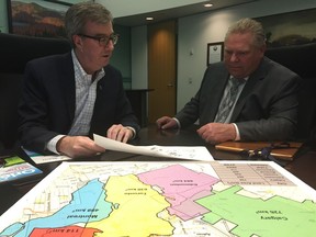 Ottawa Mayor Jim Watson met with Progressive Conservative Leader Doug Ford at Ottawa City Hall on April 16, 2018 to discuss the city's priorities, including the Stage 2 LRT plan. Jon Willing/Postmedia