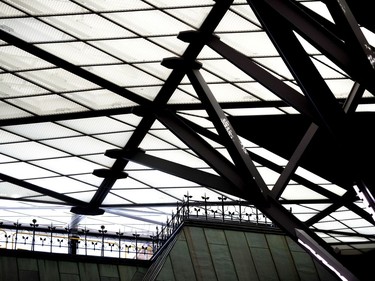 The steel structure supporting the glass roof meets the original roofline of Parliament Hill's West Block above the interim House of Commons Chamber during a media tour in Ottawa on Friday, June 15, 2018.