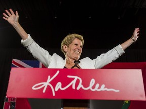 Kathleen Wynne takes to the stage before announcing she is stepping down as leader of the Ontario Liberal party at the election watching party at York Mills Gallery in Toronto, Ont on Thursday June 7, 2018.