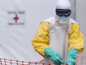 A health worker wearing a personal protective equipment.