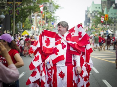 Canada Day celebrations took over the downtown core of Ottawa Sunday July 1, 2018. Noral Rebin was well decked out in Canada Day gear and Canada Flags Sunday.
