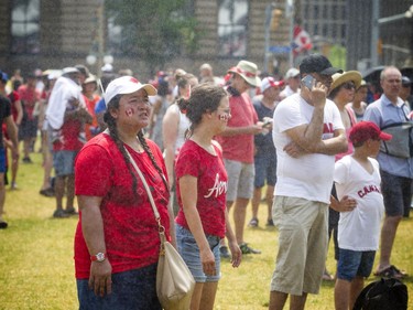 Canada Day celebrations took over the downtown core of Ottawa Sunday July 1, 2018. A cool mist was being shot out of snow making machines on Parliament Hill.   Ashley Fraser/Postmedia