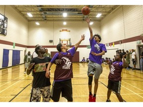Alrayan Abdelkareem nails a two-pointer at Saturday's Balling 4 Our Brothers basketball tournament at the Michele Heights Community Centre.