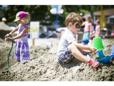 Four-year-old Jacob Borris enjoyed getting into the sand to play Saturday.