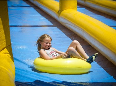 The 'mega glisse,' a 600-foot water slide, took over Main Street, a perfect way to cool down on a sunny Saturday.