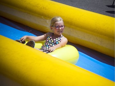 The 'mega glisse,' a 600-foot water slide, took over Main Street, a perfect way to cool down on a sunny Saturday.