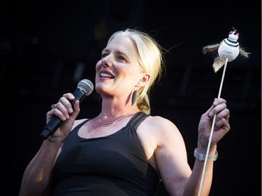 Catherine McKenna MP for Ottawa Centre and Minister of the Environment and Climate Change held up a toy killdeer as she addressed the crowd Sunday July 8, 2018, at RBC Bluesfest.