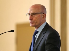 Mayo Schmidt, former president and CEO of Hydro One, speaks during the Windsor-Essex Chamber of Commerce Distinguished Speaker Luncheon held at the Caboto Club in Windsor, Ontario.