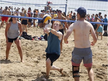 Action from the HOPE Volleyball SummerFest at Mooney's Bay Beach on Saturday. Patrick Doyle/Postmedia