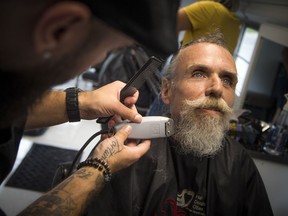Anne Donovan, the founder, and Francois Thibeault co-founder, had the official launch of the Rolling Barber Sunday July 22, 2018 at the corner of Daly and King Edward. Glen Hannaberry got a clean up of his facial hair Sunday morning.