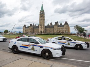 Police presence on Parliament Hill Monday after a man was wrestled to the ground after disrupting the Changing of the Guard ceremony.