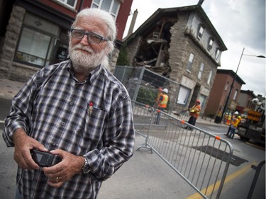 The heritage building at 1119 Wellington known as the Magee House will be partially torn down and reassessed to see if the building will be structurally sound. Crews were on site Friday July 27, 2018 preparing the area for the demolition.  Ovidio Sbrissa who has owned the building for 17 years and was living at the location chose the perfect time to step out for a pizza, as he was gone for dinner when the building crumbled.   Ashley Fraser/Postmedia