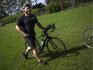 The 37th Annual National Capital Triathlon took place Saturday July 28, 2018 at Mooney's Bay and the surrounding area. Adolphes McKay swaps from swimming gear over to bike gear before hitting the pavement.   Ashley Fraser/Postmedia