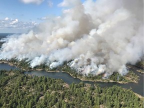 An aerial view taken over the Parry Sound 33 fire is shown in this handout image. The blaze, known as Parry Sound 33, sprung up on July 18. Ontario firefighters have been fighting it with the help of their counterparts from other provinces, as well as the United States and Mexico.