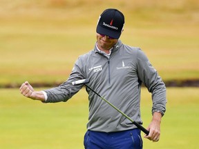 Zach Johnson celebrates a birdie on the 18th hole during the second round of the Open Championship at Carnoustie Golf Club on Friday.