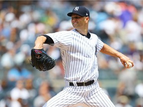 J.A. Happ #34 of the New York Yankees pitches in the first inning against the Kansas City Royals at Yankee Stadium on July 29, 2018 in the Bronx borough of New York City.