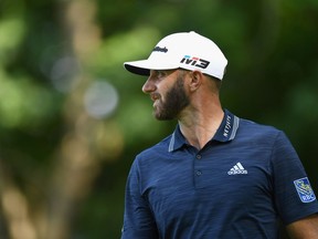 Dustin Johnson walks on the ninth green during the final round at the RBC Canadian Open at Glen Abbey Golf Club on July 29, 2018 in Oakville, Ont.