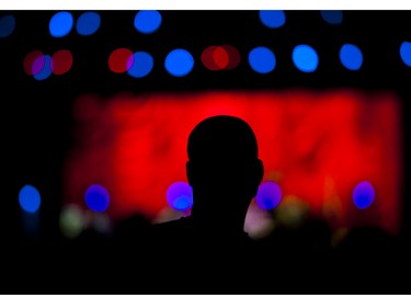 The silhouette of a man during the Blue Rodeo performance.