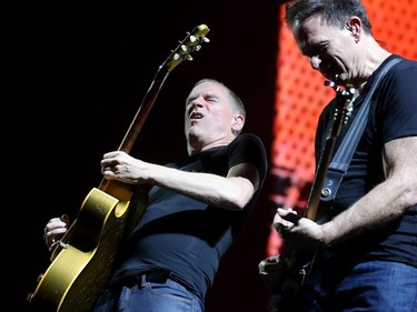 Bryan Adams (left, with his bass player) plays to a packed house on opening night of Bluesfest Thursday (July 5, 2018). Julie Oliver/Postmedia