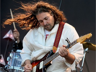 War on Drugs lead singer and guitarist Adam Granduciel played on the main stage Friday.