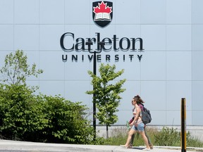 Some students and faculty mill around campus at Carleton University Monday (July 9, 2018).