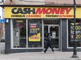Payday loan businesses along a major road in Ottawa. (Errol McGihon/Postmedia)